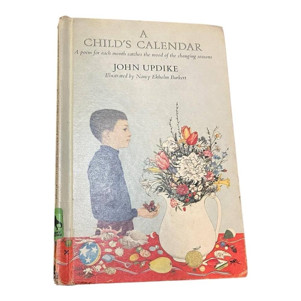 A CHILD'S CALENDAR By John Updike & Nancy Ekholm Burkert - Hardcover Ex Library